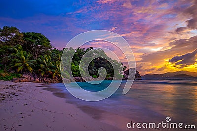 Colorful sunset over Anse Severe Beach at the La Digue Island, Seychelles Stock Photo