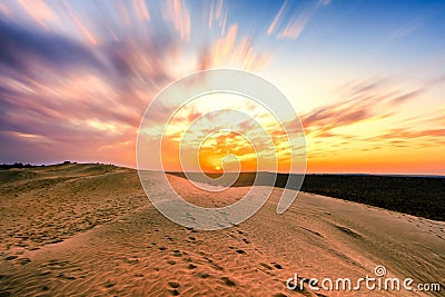 Colorful Sunset over sand dunes at Jaisalmer Stock Photo