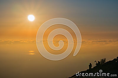 Colorful sunset over a sea of clouds, Mission Peak, south San Francisco bay area, California Stock Photo