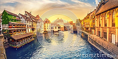 sunset in the region of Little France in the city of Strasbourg. Famous half-timbered houses, the river Ill and the Stock Photo