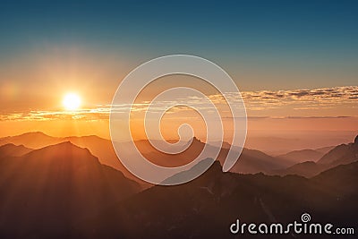 Colorful sunset on top of austrian mountain Stock Photo
