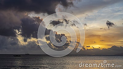 Colorful sunset on a tropical island. Pink and purple clouds in the sky Stock Photo