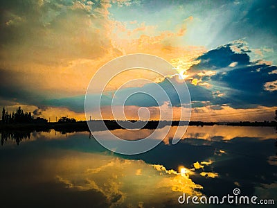 Colorful sunset. Very beautiful sky with reflection in the water! Stock Photo