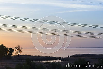 Colorful sunset wires for electric power transmission Stock Photo