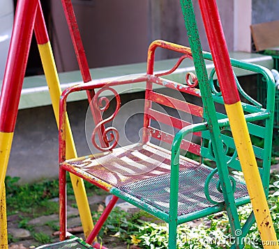 colorful swings on the playground Stock Photo