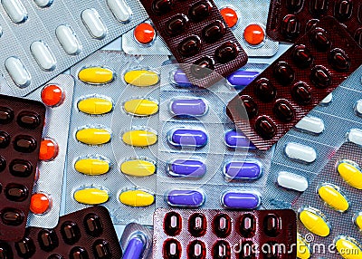 Colorful tablet pills in blister packs. Global healthcare concept. Pain killers medicine use for relieve pain. Stock Photo