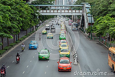 Colorful Taxi parked in a row on the road at Chatuchak, Bangkok. Editorial Stock Photo