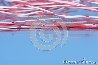 Colorful telecommunication cables on metallic surface Stock Photo