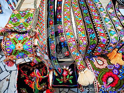 Colorful textile handmade belts and handbags Stock Photo