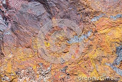 The colorful texture of natural rock. Rough stone texture background Stock Photo