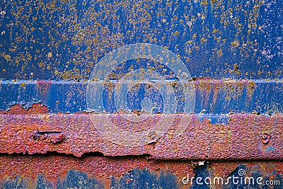 Colorful textured weathered surface of an old car Stock Photo