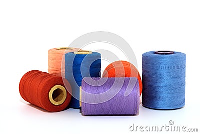 Colorful thread bobbins Stock Photo
