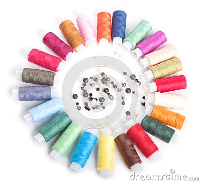Colorful threads and beads on white Stock Photo