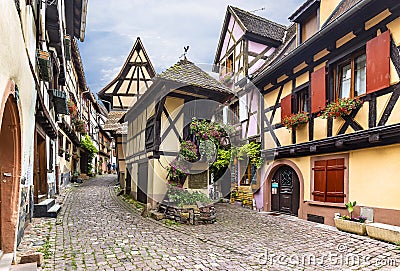 Colorful timbered houses of the Alsatian town of Eguisheim, France Editorial Stock Photo