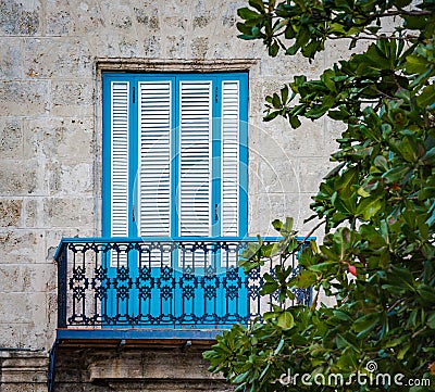 Colorful turquoise shutters of colonial balcony in Havana Vieja, Old town, Cuba Stock Photo