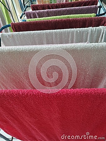 Colorful TOWEL CLOSET or STANDING TOWEL RACK Knockdown 5 TOWELS Stock Photo