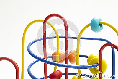 Colorful toy for preschoolers consisting of an iron structure and several balls Stock Photo