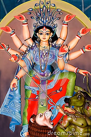 Colorful Tribal Goddess Durga idol in Rural Folk Design and theme. Worshipping the Divine Mother. Religious Handmade Sculpture. Editorial Stock Photo