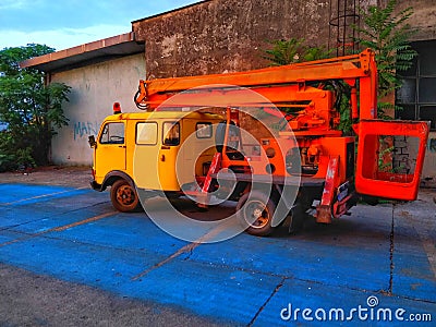 Colorful Truck Parked On A Blue Parking Spot Stock Photo