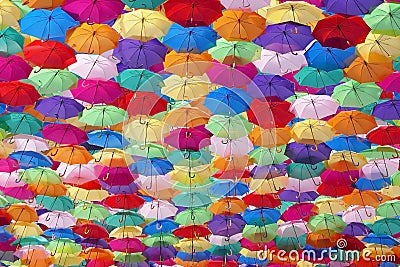 Colorful umbrellas decorating a street in agueda Stock Photo