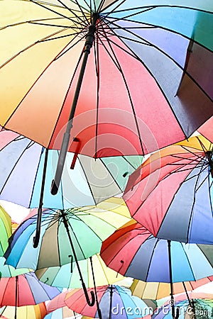Colorful umbrellas hung on the street Editorial Stock Photo