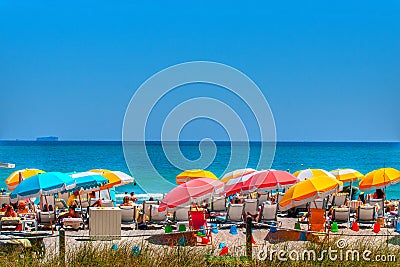 Colorful umbrellas on south beach in Miami Florida. Stock Photo