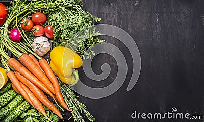 Colorful various of organic farm vegetables in a wooden box on wooden rustic background top view close up border ,place text Stock Photo