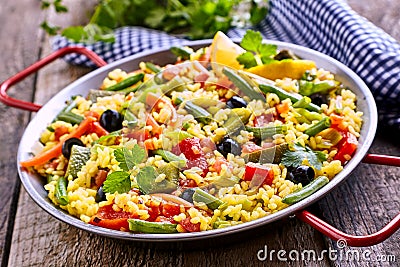 Colorful Vegetarian Paella Rice Dish Served in Pan Stock Photo