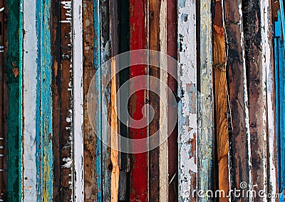 Colorful vertical lines, pile of wooden doors Stock Photo