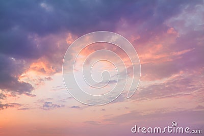 Colorful vibrant dramatic sky with purple to orange clouds. Sunset time. Beautiful nature background Stock Photo