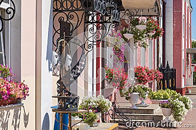 Colorful view with flowers of the street in the Belarusian town. Stock Photo