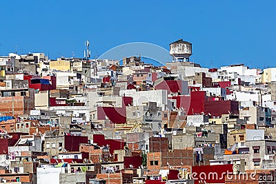 Tangier, Morrocco - Colorful View of Tangier Houses Rooftops Skyline Water Tower Antenna Stock Photo