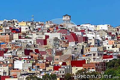 Tangier, Morrocco - Colorful View of Tangier Houses Rooftops Skyline Water Tower Antenna Stock Photo