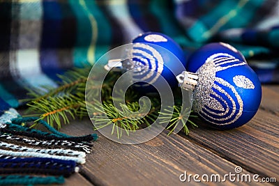 Blue woolen plaid and festive decorations. New Year card Stock Photo