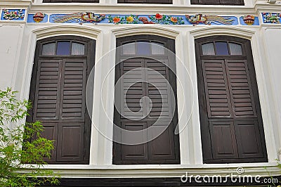 Colorful vintage windows on a shop house in Penang, Malaysia Editorial Stock Photo