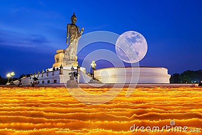 Colorful walk with lighted candles in hand around temple Stock Photo