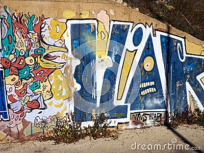 Colorful wall background texture Graffiti Editorial Stock Photo