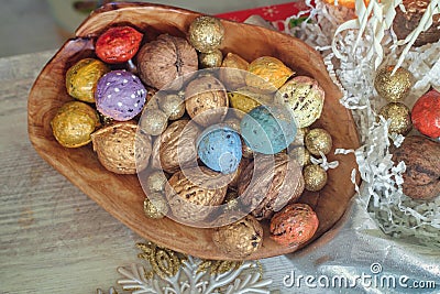 Colorful walnuts in the wooden bowl Stock Photo