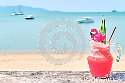 Colorful watermelon mocktail at the beach bar. Vacation, get away, summer outing concept Stock Photo