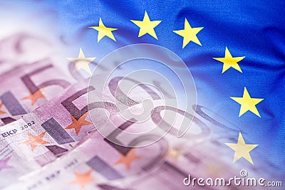 Colorful waving european union flag on a euro money background Stock Photo