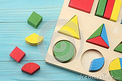 colorful wooden cubes on blue wooden background. Top view. Toys in the table Stock Photo