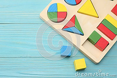 colorful wooden cubes on blue wooden background. Top view. Toys in the table Stock Photo