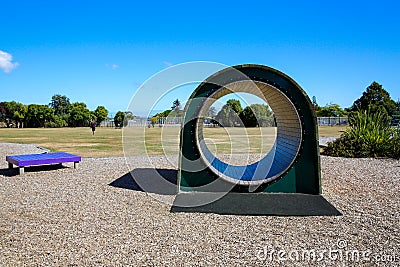 Colorful wooden Kids playground tunnel. Levin, New Zealand Stock Photo