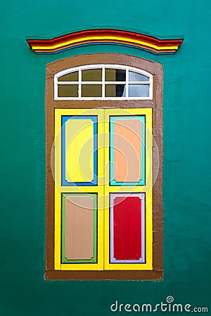 Colorful wooden window exterior Colonial style architecture building or home and living in Little India, Singapore Stock Photo