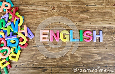 The colorful word `ENGLISH` next to a pile of other letters Stock Photo