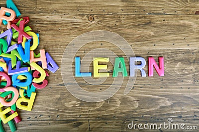 The colorful word `LEARN` next to a pile of other letters Stock Photo