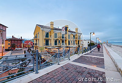 Colorfull embankment in Caorle Italy in evening time Stock Photo