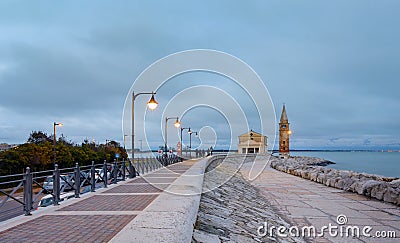 Colorfull embankment in Caorle with lanterns in the evening Stock Photo