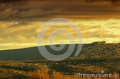 Colorfull morning with Pajstun castle and village beneath Stock Photo