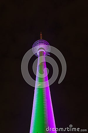 Colorfully Illuminated Berlin Tower at Night Editorial Stock Photo